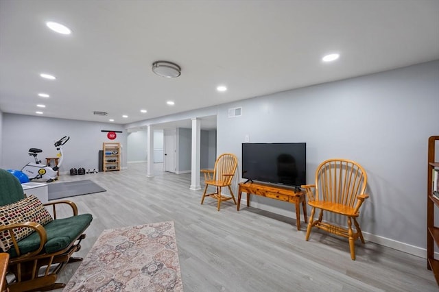 107 Washington St, Pembroke, MA 02359 - living area featuring wood finished floors and recessed lighting