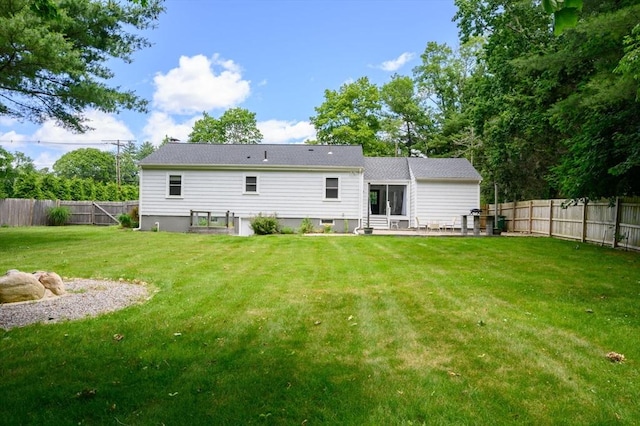 107 Washington St, Pembroke, MA 02359 - rear view of property with a fenced backyard and a patio