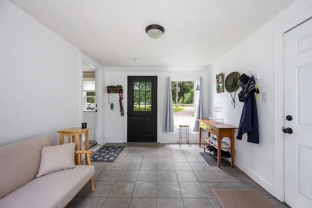 107 Washington St, Pembroke, MA 02359 - tiled foyer entrance featuring baseboards