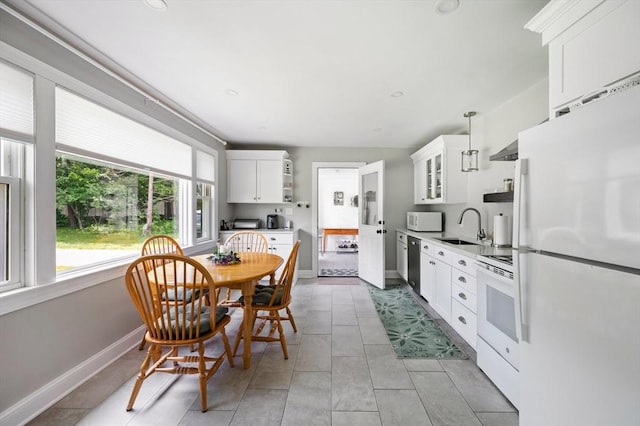 107 Washington St, Pembroke, MA 02359 - kitchen featuring white appliances, open shelves, white cabinetry, light tile patterned floors, and recessed lighting