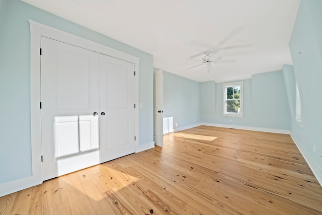 interior space featuring light hardwood / wood-style flooring and ceiling fan