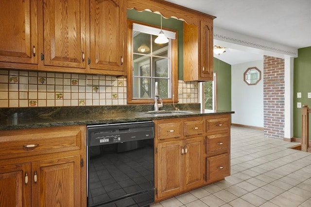 3 Norman Ave, Newburyport, MA 01950 - kitchen featuring black dishwasher, tasteful backsplash, light tile patterned floors, brown cabinets, and vaulted ceiling