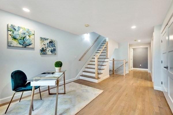 office area with light hardwood / wood-style flooring