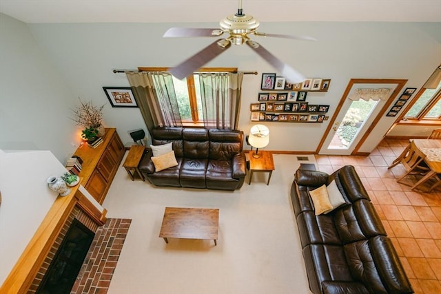 9 Buffalo Run, Southborough, MA 01772 - living area featuring healthy amount of natural light, ceiling fan, tile patterned floors, and a fireplace