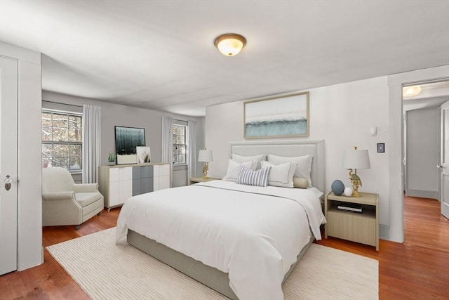 bedroom featuring hardwood / wood-style flooring