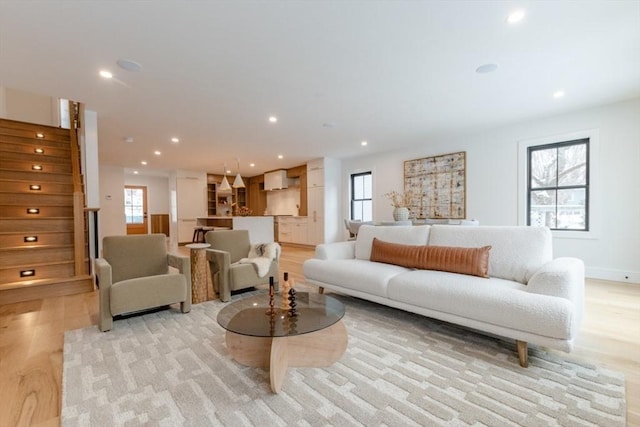 living room with light hardwood / wood-style floors