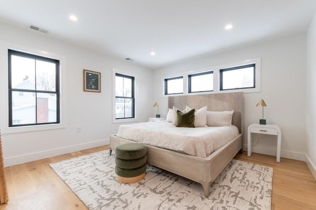 bedroom featuring light wood-type flooring