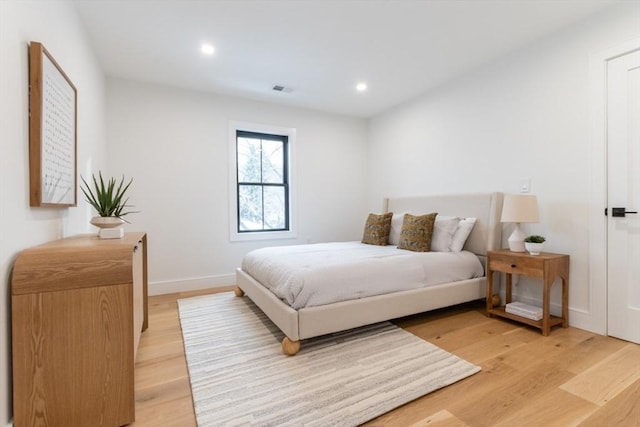 bedroom featuring light hardwood / wood-style flooring