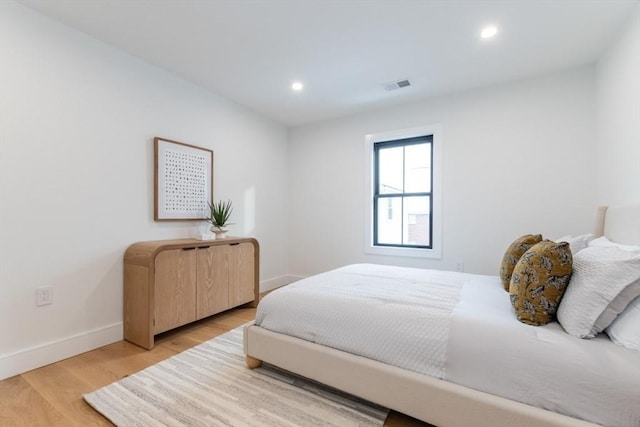 bedroom featuring hardwood / wood-style flooring