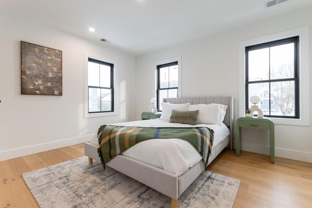 bedroom featuring wood-type flooring