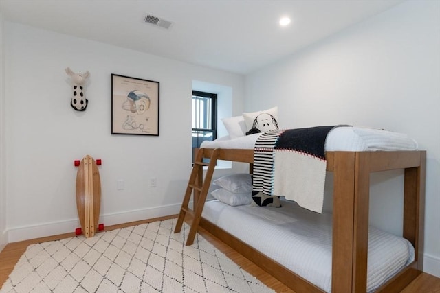 bedroom featuring light hardwood / wood-style floors