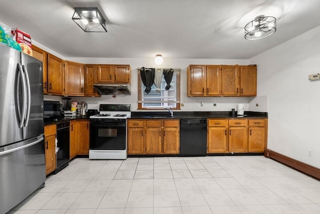 32 Saint Marks Rd Unit 1, Boston, MA 02124 - kitchen with white range with gas cooktop, black dishwasher, freestanding refrigerator, range hood, and brown cabinets