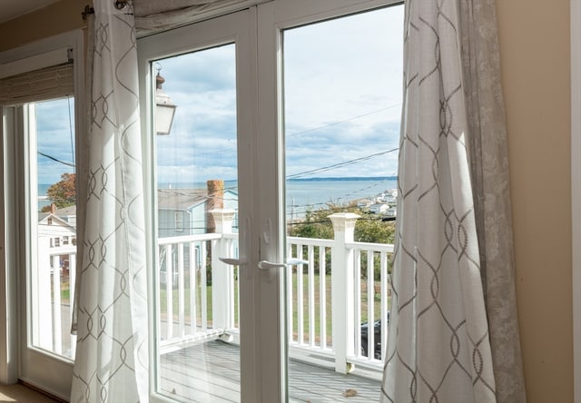 entryway with a water view