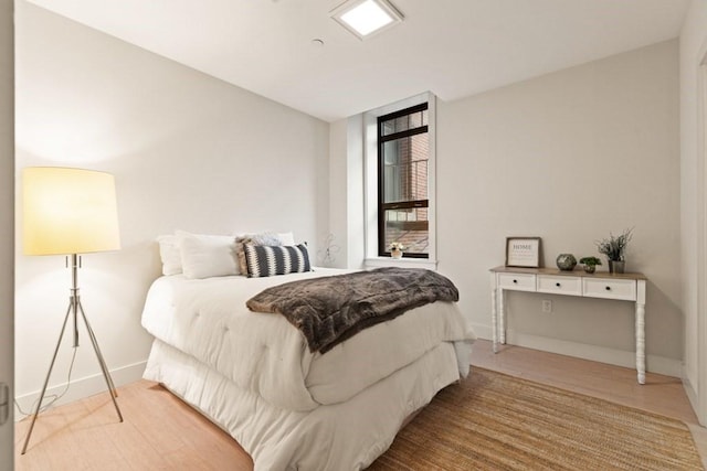 bedroom featuring hardwood / wood-style flooring