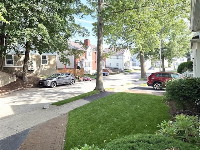 12 Cozy St Unit 12, Watertown, MA 02472 - view of grassy yard featuring a residential view