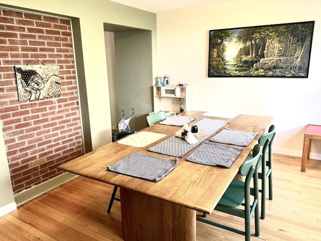 12 Cozy St Unit 12, Watertown, MA 02472 - dining space featuring wood finished floors and baseboards