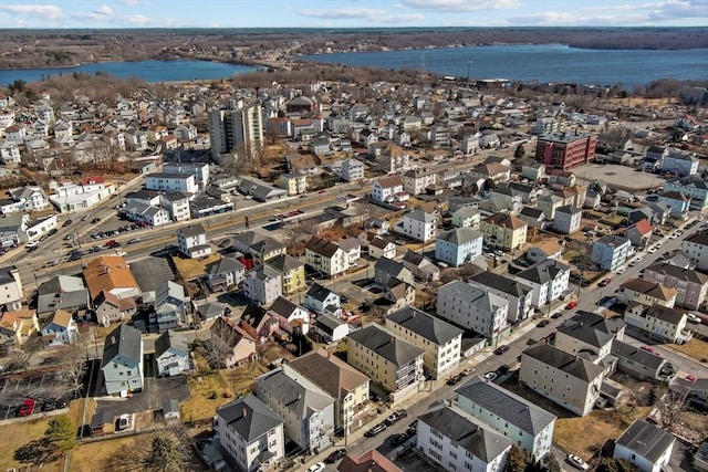 aerial view with a residential view and a water view