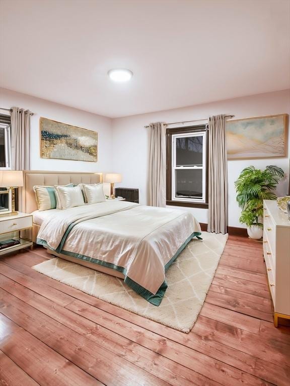 bedroom with wood finished floors