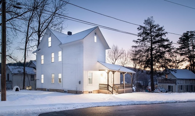 view of front of property featuring a chimney