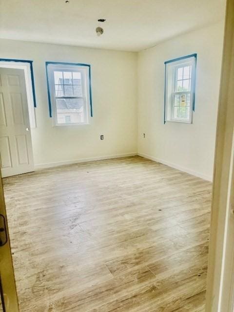 70 Preston St, Marlborough, MA 01752 - spare room with light wood finished floors and baseboards
