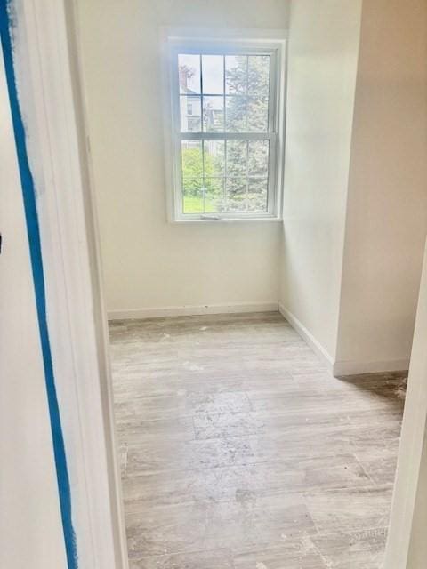 70 Preston St, Marlborough, MA 01752 - spare room featuring baseboards and wood finished floors