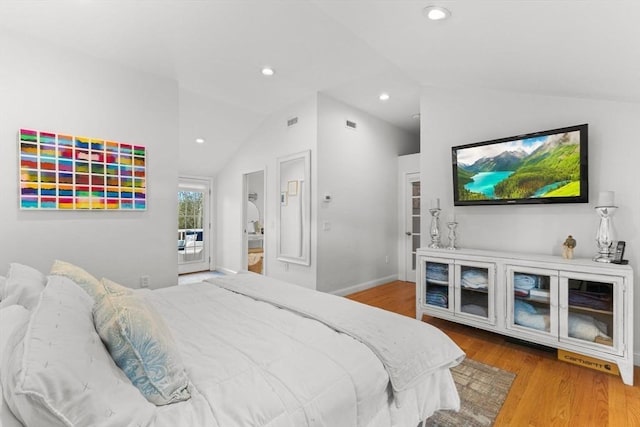 bedroom with wood finished floors, baseboards, lofted ceiling, and recessed lighting