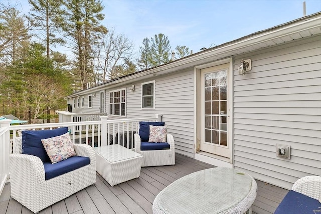 deck with an outdoor living space