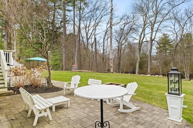 view of patio / terrace featuring stairway