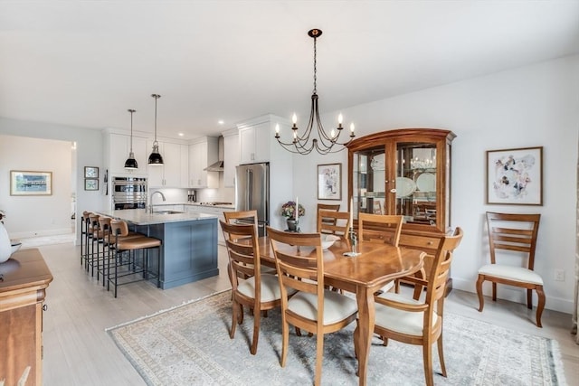 51 Tinkers Blf Unit 51, Plymouth, MA 02360 - dining space with a chandelier, baseboards, light wood finished floors, and recessed lighting