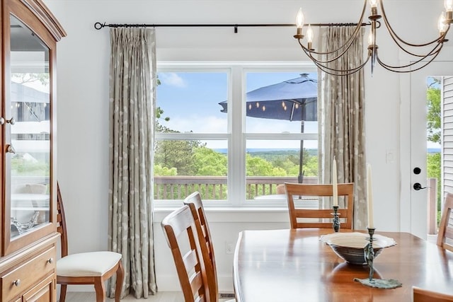 51 Tinkers Blf Unit 51, Plymouth, MA 02360 - dining space featuring plenty of natural light and a chandelier