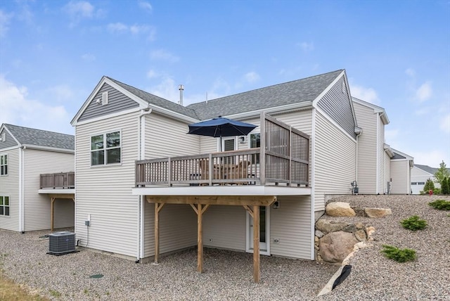 51 Tinkers Blf Unit 51, Plymouth, MA 02360 - rear view of house featuring a wooden deck and central air condition unit