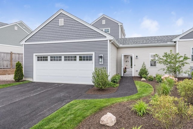 51 Tinkers Blf Unit 51, Plymouth, MA 02360 - view of front of home with a garage and driveway