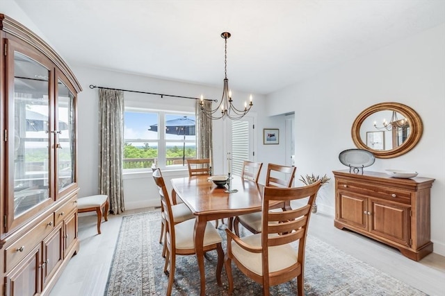 51 Tinkers Blf Unit 51, Plymouth, MA 02360 - dining space featuring a chandelier and baseboards