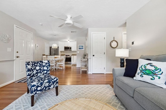 2 Englewood Dr Unit F-6, Harwich, MA 02645 - living area with wood finished floors and a ceiling fan