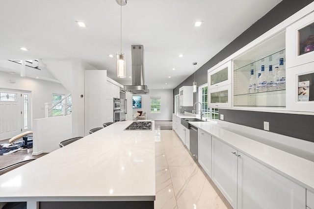 24 Clark St, Taunton, MA 02780 - kitchen featuring a sink, a large island, light countertops, white cabinets, and recessed lighting