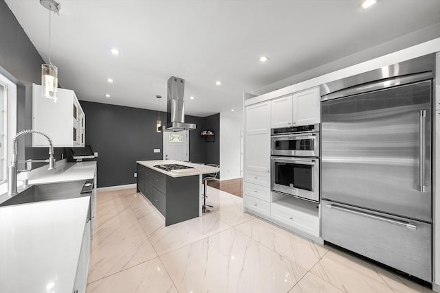 24 Clark St, Taunton, MA 02780 - kitchen featuring stainless steel appliances, island exhaust hood, a center island, white cabinets, and recessed lighting