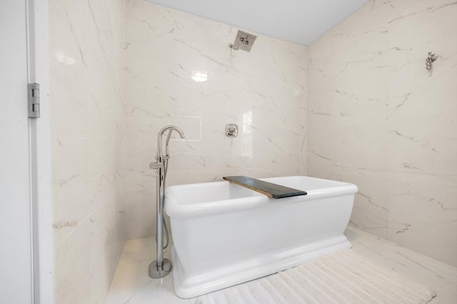 24 Clark St, Taunton, MA 02780 - full bath featuring a soaking tub and tile walls