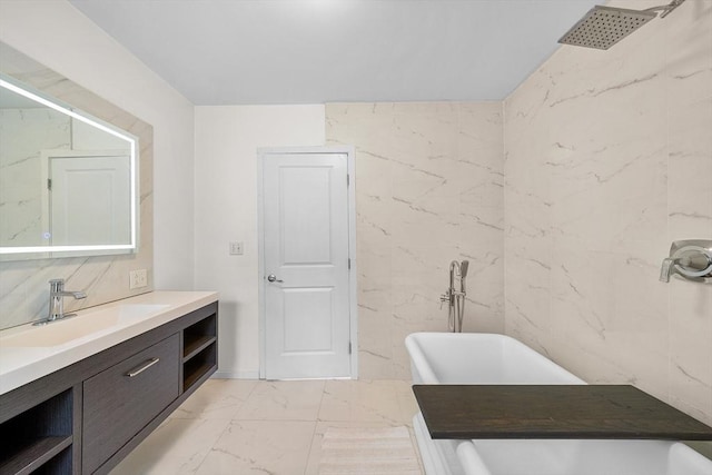 24 Clark St, Taunton, MA 02780 - full bathroom with marble look tiles, vanity, a freestanding bath, and a shower