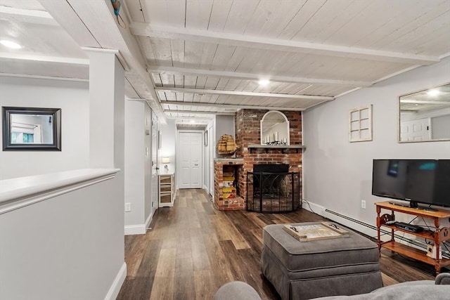 22 Tenney St, Georgetown, MA 01388 - living area with a fireplace, hardwood / wood-style floors, and a wooden ceiling with exposed beams