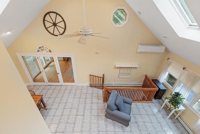 22 Tenney St, Georgetown, MA 01388 - sunroom featuring vaulted ceiling, baseboard heating, french doors, a skylight, and a baseboard heating unit