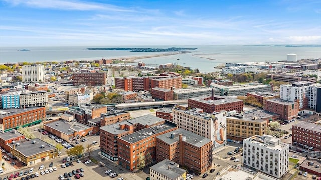 bird's eye view featuring a view of city and a water view