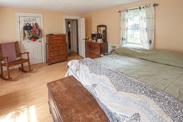 bedroom with hardwood / wood-style floors