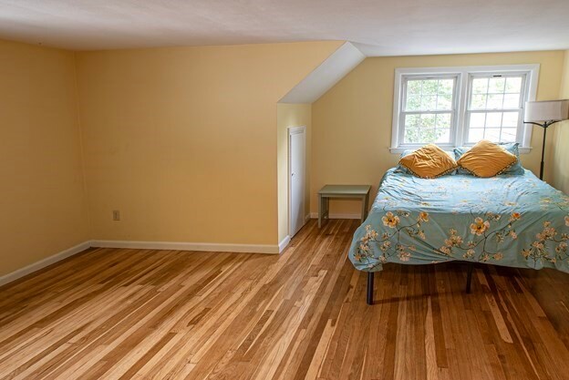 bedroom with light wood-type flooring