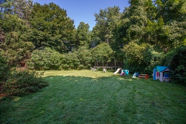 view of yard with a trampoline