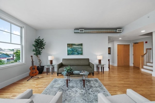 living room with hardwood / wood-style floors