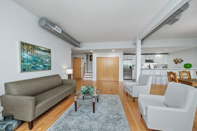 living room featuring light wood-type flooring