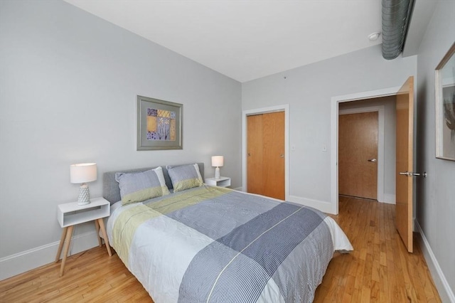 bedroom featuring light hardwood / wood-style flooring