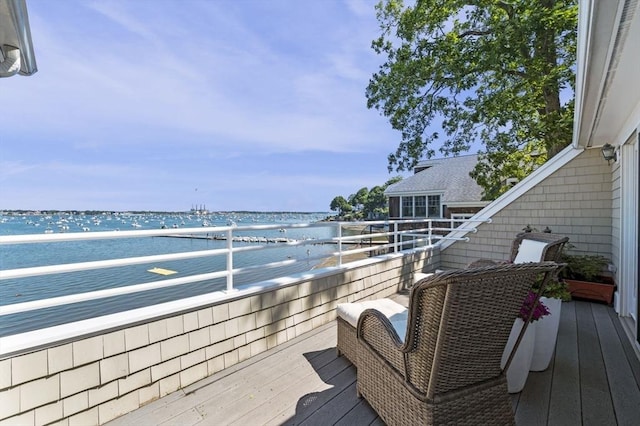 deck featuring a water view