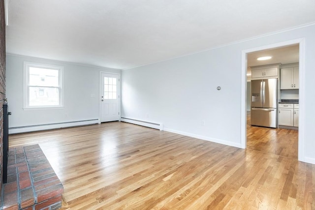 6 Post Gate Rd, Danvers, MA 01923 - unfurnished living room featuring a baseboard radiator, baseboard heating, crown molding, light wood-style floors, and baseboards