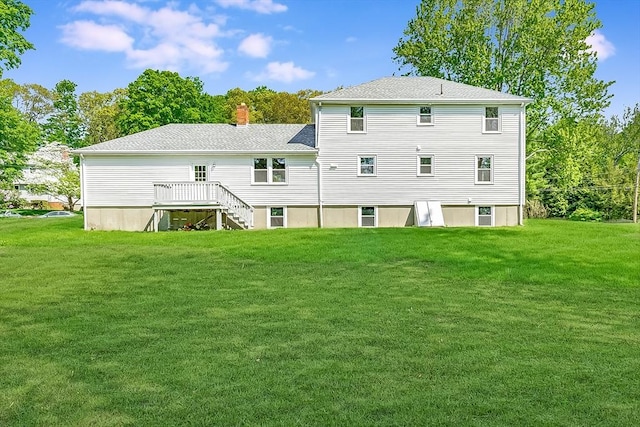 6 Post Gate Rd, Danvers, MA 01923 - back of property with a lawn, stairs, a chimney, and a deck